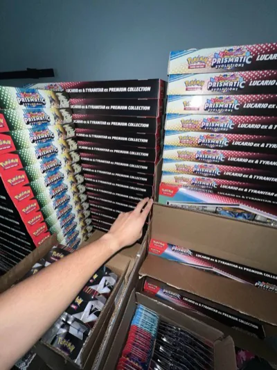 Pokémon premium collection boxes filling several open cartons